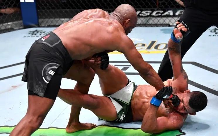 Kamaru Usman lands the final blow against Gilbert Burns. Getty Images