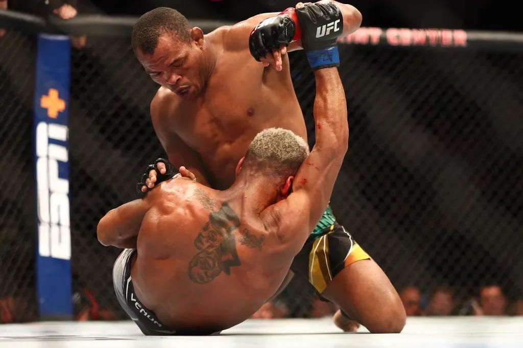 Francisco Trinaldo controls Danny Robert on the mat. (Mark J. Rebilas-USA TODAY Sports)