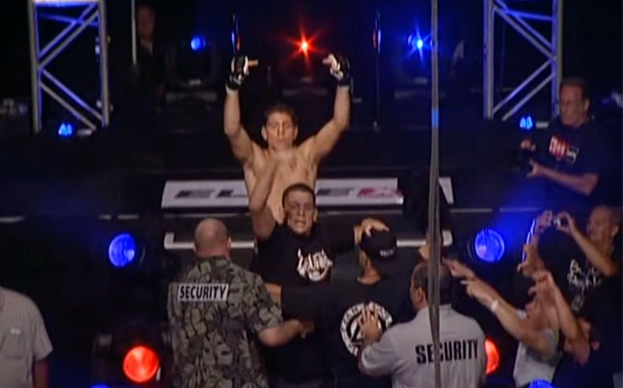 Security escorting the Diaz brothers to the back after their brawl. Credits to: EliteXC