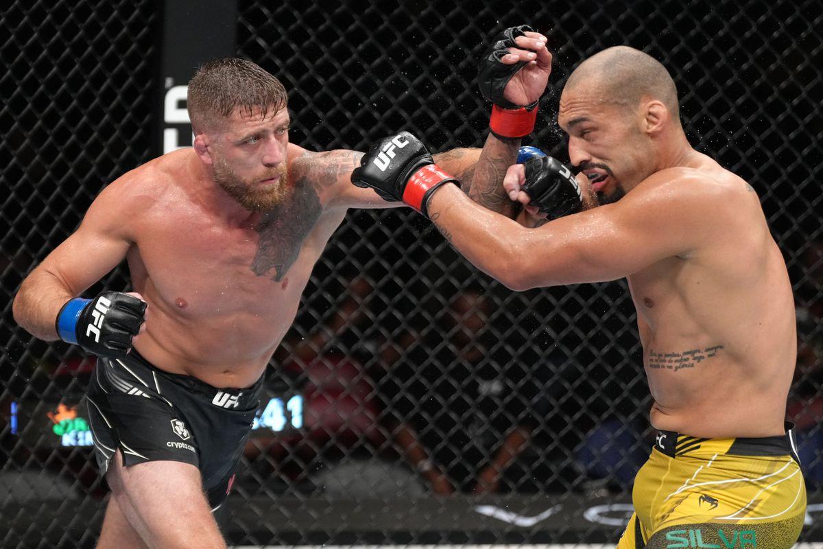 Gerald Meerschaert lands a left hand on Bruno Silva. Credit: MMA Mania.