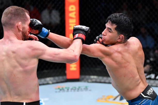 Adrian Yanez connecting with a fast jab on Davey Grant. Credits to: Chris Unger-Getty Images.