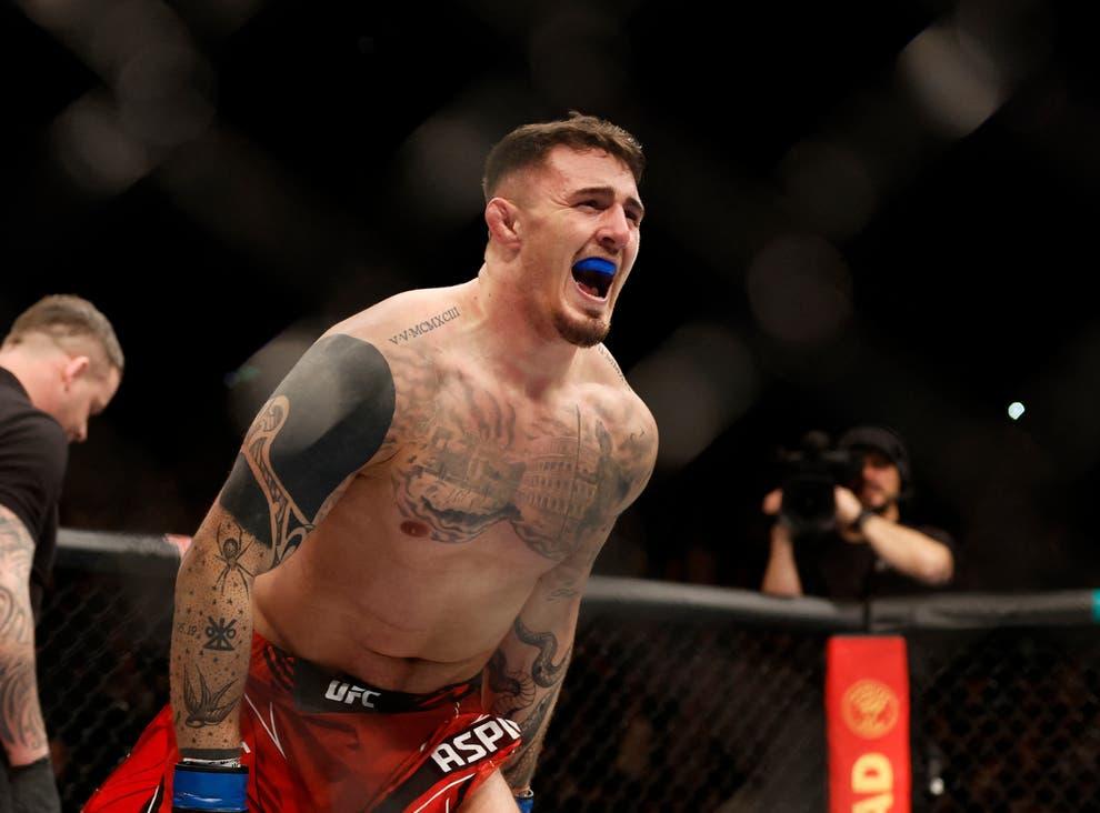 Tom Aspinall celebrates after finishing Alex Volkov in the first round. Credits to: Action Images