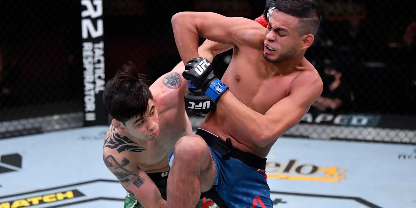 Brandon Moreno and Brandon Royval facing eachother for the first time at UFC 255. Credits to: Chris Unger - Zuffa LLC.