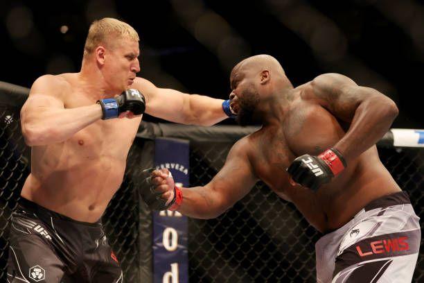 Sergei Pavlovich connecting with a strike against Derrick Lewis at UFC 277. Credits to:  Carmen Mandato-Zuffa LLC.