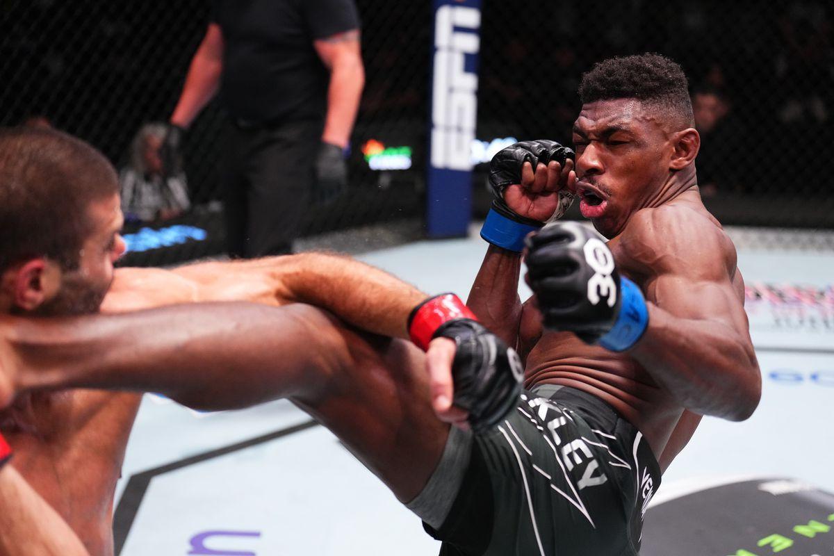 Joaquin Buckley lands a brutal head kick on Andre Fialho. Credit: MMA Fighting.