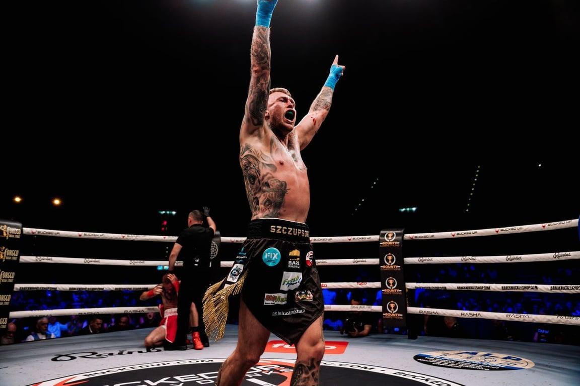 Michal Lesniak celebrates his win over McDonough. via UD. Credits to: BKFC.