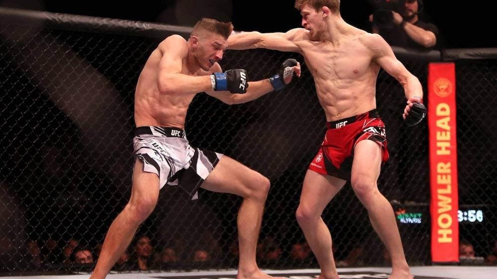 Arnold Allen lands a flurry against Dan Hooker. Credits to: Kieran Cleeves-Zuffa LLC