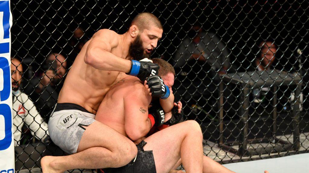 Khamzat Chimaev dominating John Phillips in his UFC debut. Credits to: Zuffa LLC