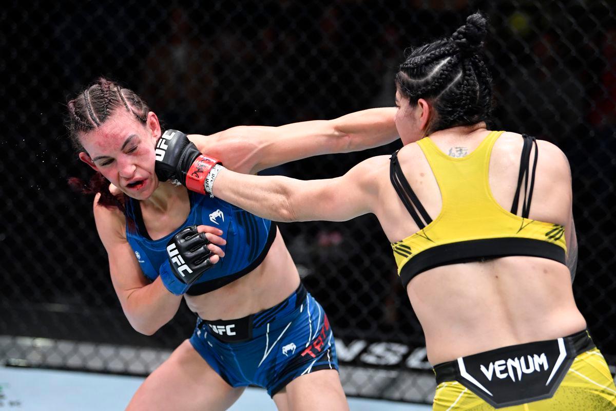 Ketlen Vieira cracks Miesha Tate with a jab. Credit: MMAFighting.