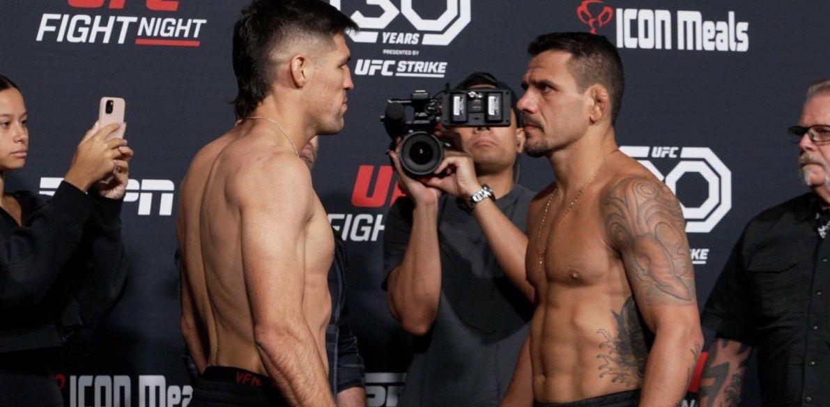 Vicente Luque and Rafael dos Anjos face off. Photo by MMAJunkie.