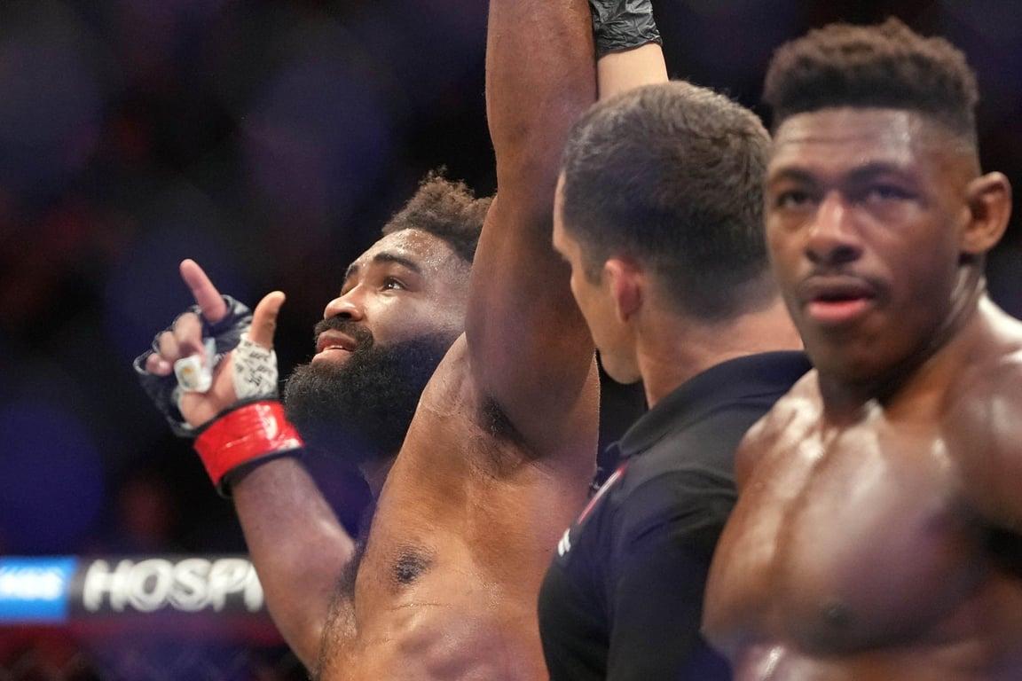 Chris Curtis gets his hand raised vs. Joaquin Buckley. Credits to: Stephen R. Sylvanie-USA Today Sports.