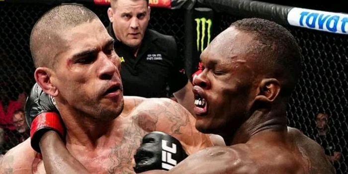 Alex Pereira hits Israel Adesanya with a left hook during his tko victory. Credits to: MMA Fight Night Live.