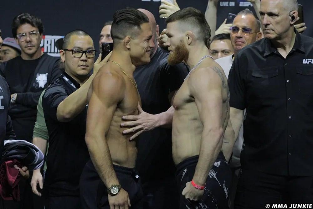 Drew Dober and Matt Frevola face off before going to war. Photo by MMAJunkie.