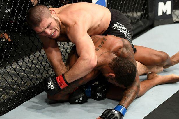 Khabib Nurmagomedov dominating Michael Johnson on the ground. Credits to: Zuffa LLC