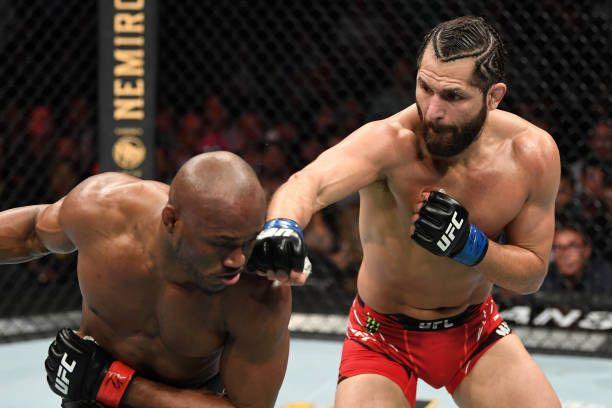 Jorge Masvidal lands clean shot against Kamaru Usman in rematch. Credits to: Josh Hedges-Getty Images.