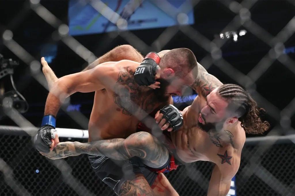 Shang Burgos beating Charles Jourdain with his grappling in his final UFC bout. Credits to: Ed Mulholland - USA TODAY Sports.