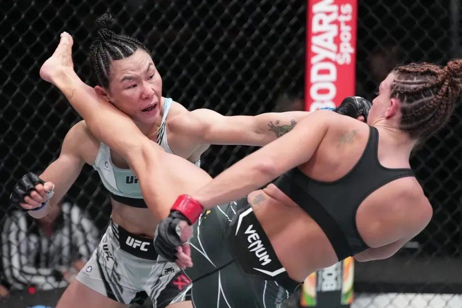 Mackenzie Dern and Yan Xionan trading strikes in their main event clash. Credits to: Jeff Botari - Zuffa LLC.