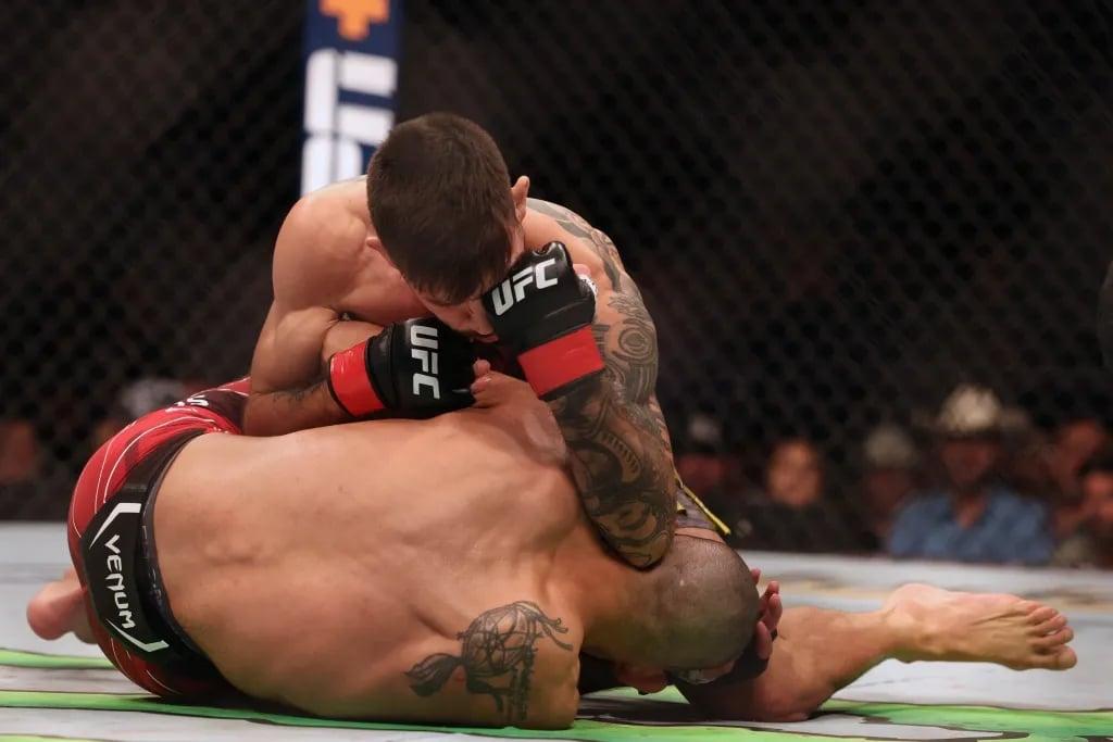 Matheus Nicolau landing a heavy elbow against Matt Schnell at UFC Fight Night: Thompson vs Holland. Credits to: Nathan Ray Seebeck - USA TODAY Sports.
