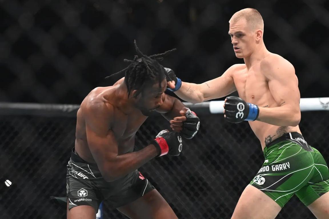 Ian Garry outstriking Neil Magny at UFC 292. Credits to: Bob DeChiara - USA TODAY Sports.