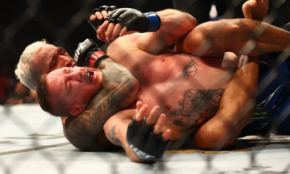 Charles Oliveira finishing Justin Gaethje with a rear-naked choke. (Mark J. Rebilas-USA TODAY Sports)