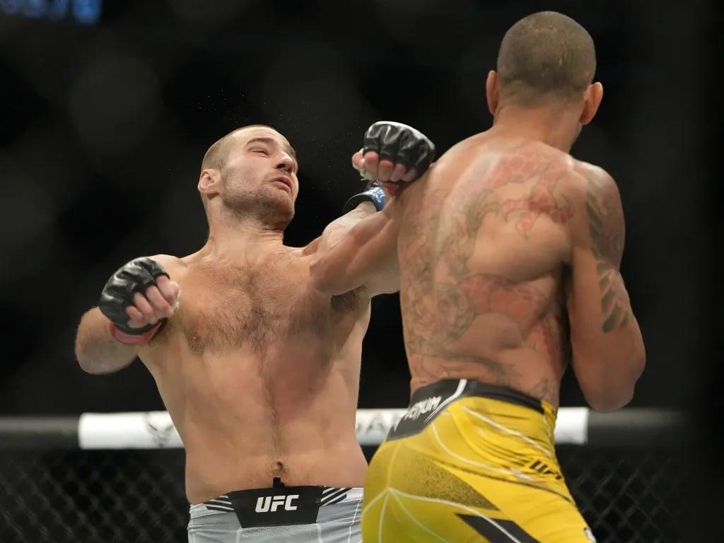Alex Pereira lands a fight finishing left hook against Sean Strickland. Credits to: Stephen R. Sylvanie-USA TODAY Sports.