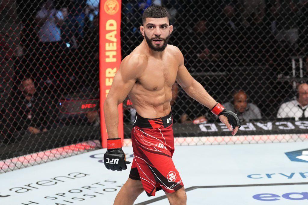 Amir Albazi reacts to submitting Fransisco Figueiredo in the first round. Credits to: Josh Hedges of Zuffa LLC.