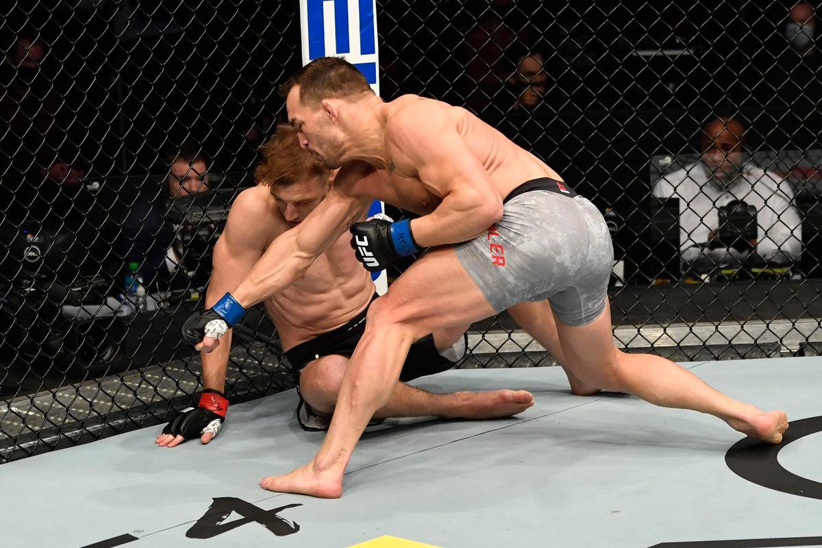 Michael Chandler finishes Dan Hooker off with ground and pound. Credit: MMA Fighting.