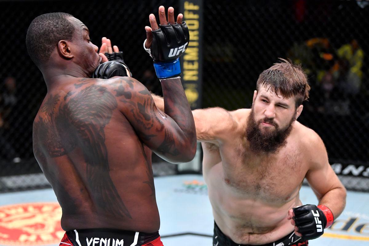 Tanner Boser cracks Ovince Saint Preux with an overhand. Credit: MMA Fighting.