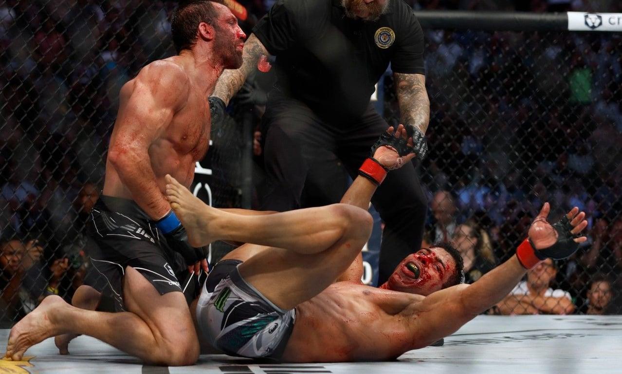 Paulo Costa celebrating after his Fight of The Night against Luke Rockhold. Credits to: Jeffrey Swinger - USA TODAY Sports.