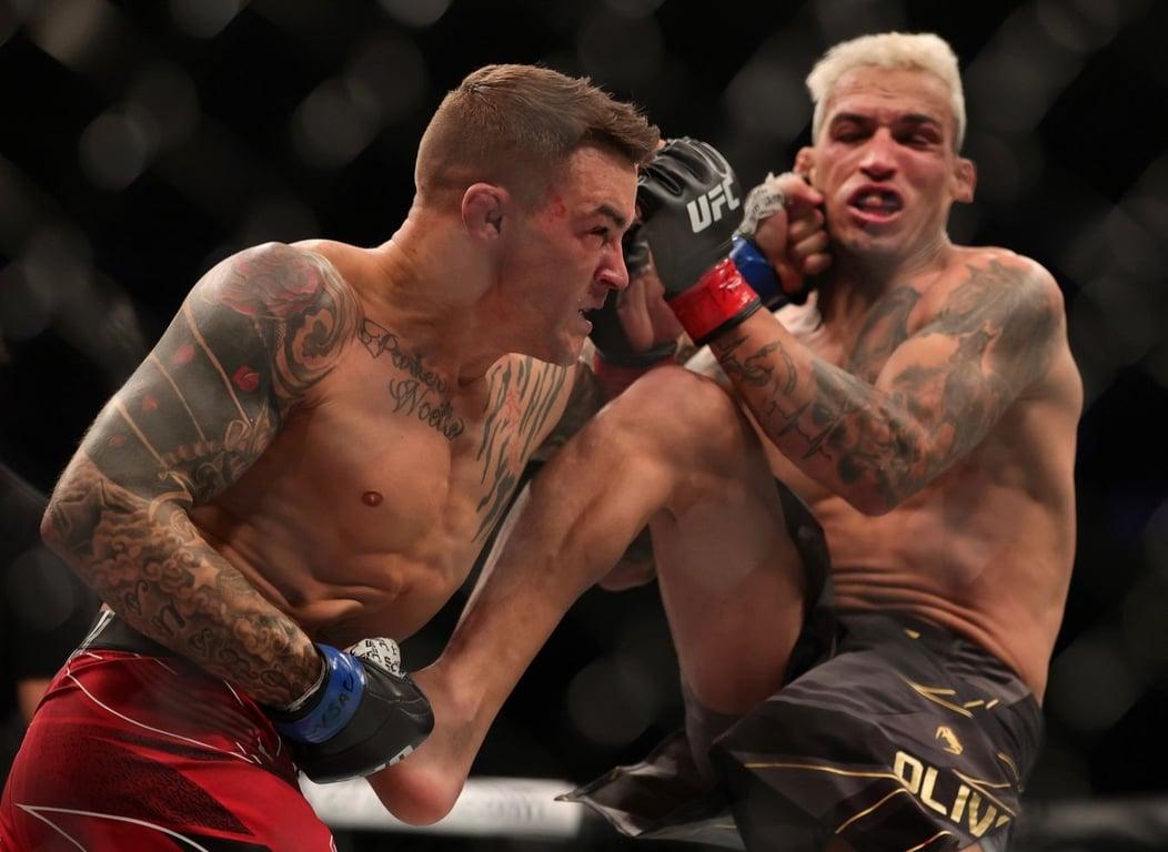 Dustin Poirier battles Charles Oliveira for Lightweight gold. Credits to: Carmen Mandato/Getty Images