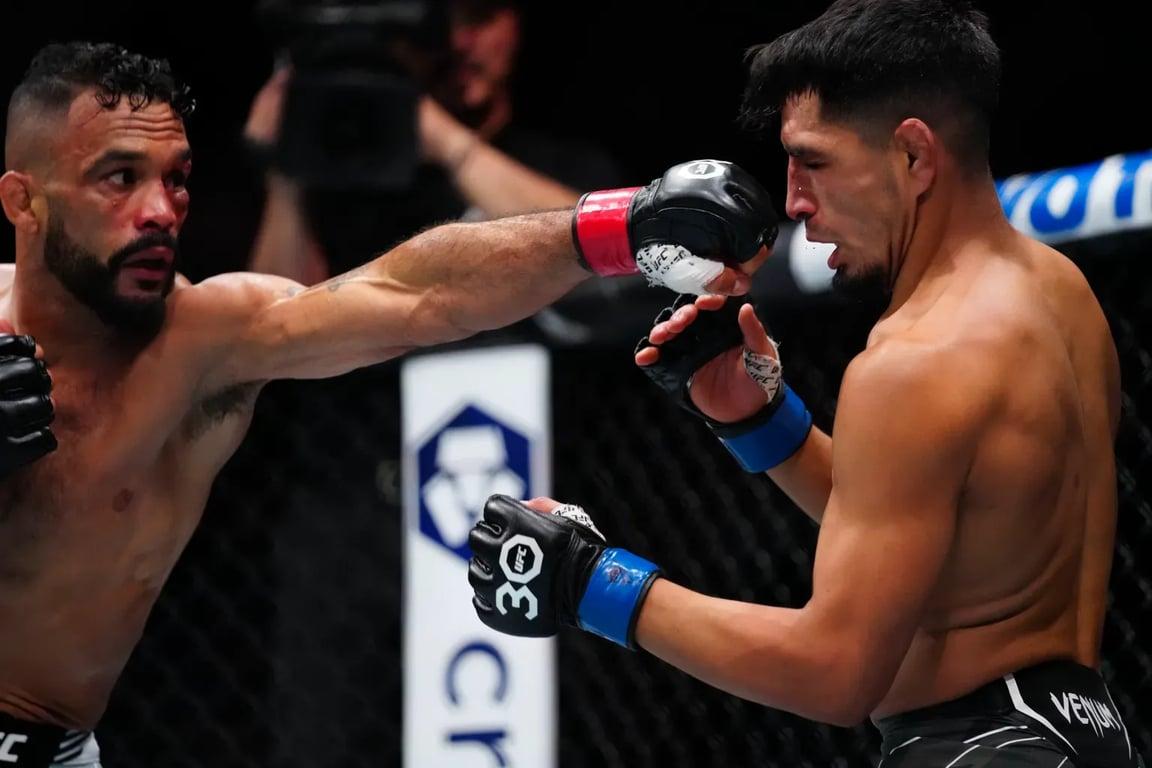 Adrian Yanez taking a jab from Rob Font at UFC 287. Credits to: Rich Storry - USA TODAY Sports.