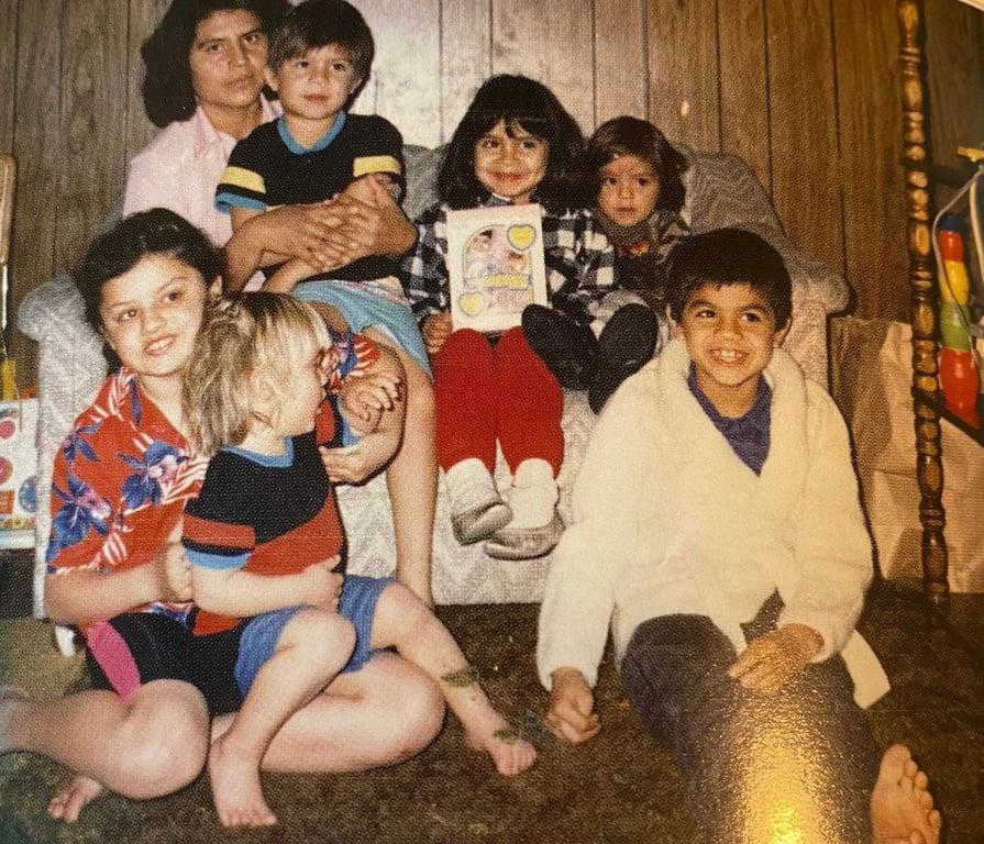 Henry Cejudo (blonde hair) and his family