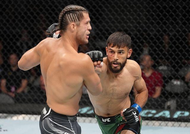 Yair lands strike on Ortega. Credits to: Getty/UFC.