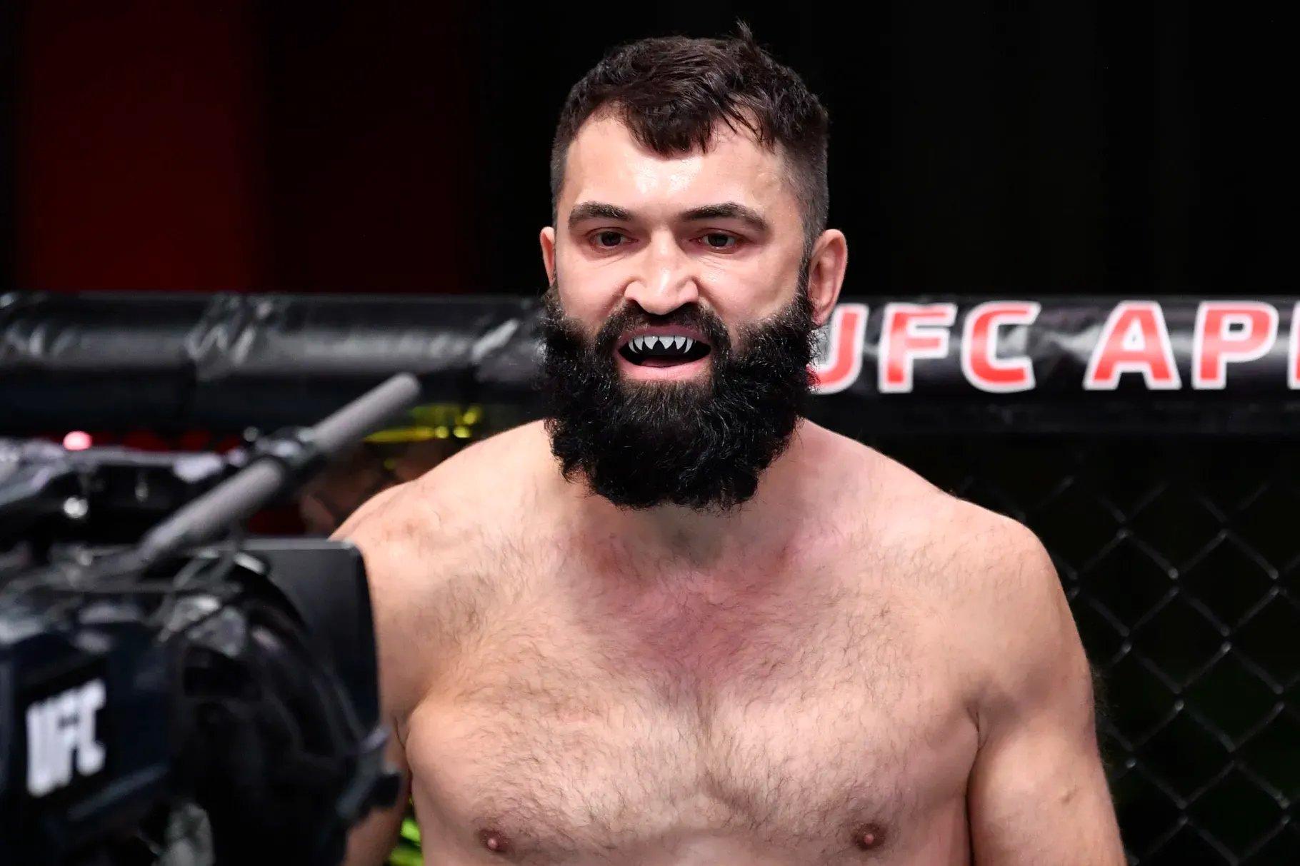 Andre Arlovski shows off his signature Bulldog mouthguard. Credits to: Jeff Bottari-Zuffa LLC