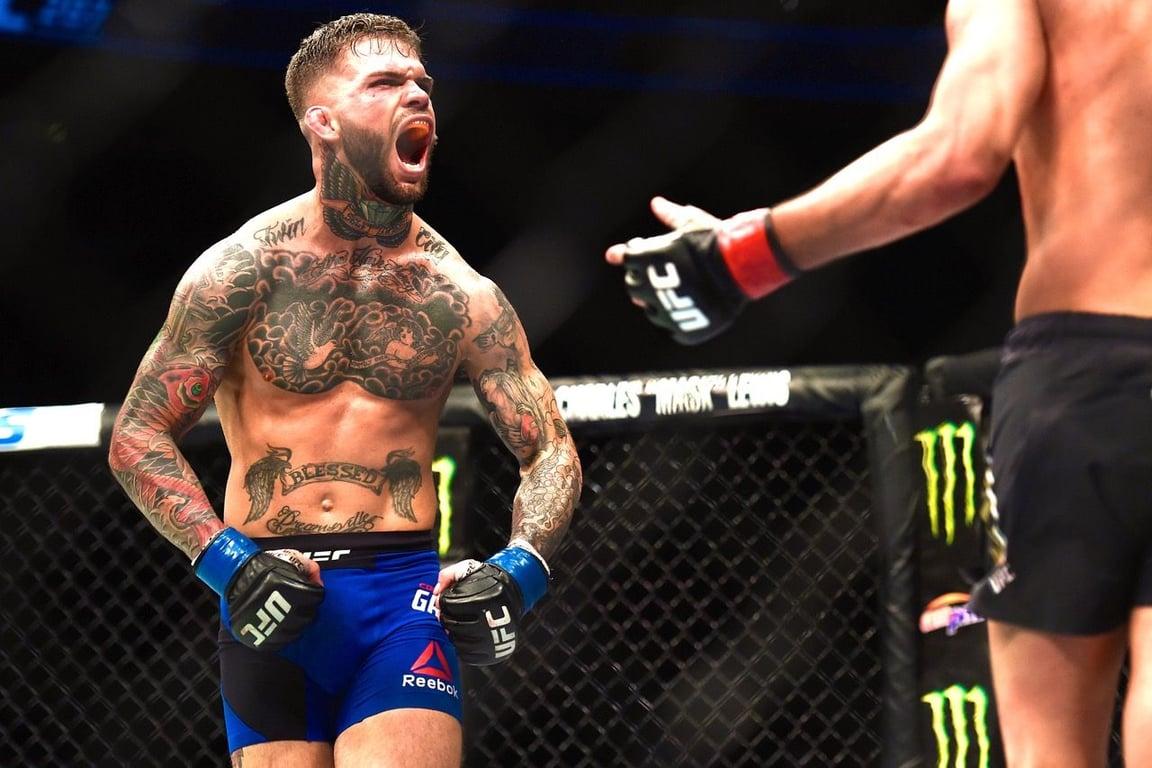 Cody Garbrandt screaming at Dominick Cruz during their bout at UFC 207. Credits to: Brandon Magnus - Zuffa LLC.
