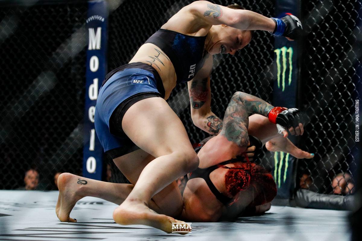 Macy Chiasson rains down ground and pound on Gina Mazany. Credit: MMA Fighting.