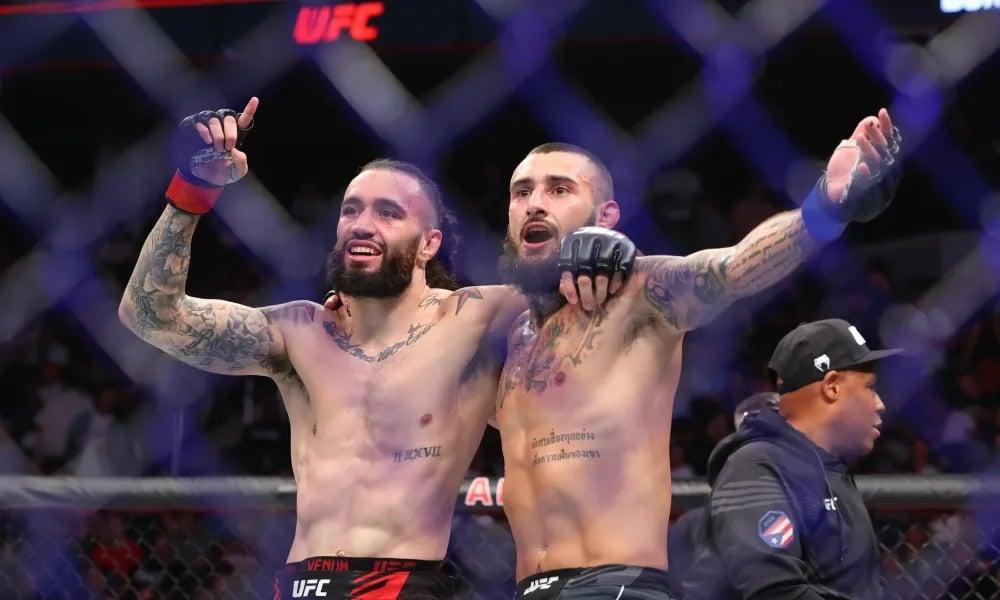 Burgos and Jourdain celebrate after close fight. Credits to: Ed Mulholland-USA TODAY Sports.