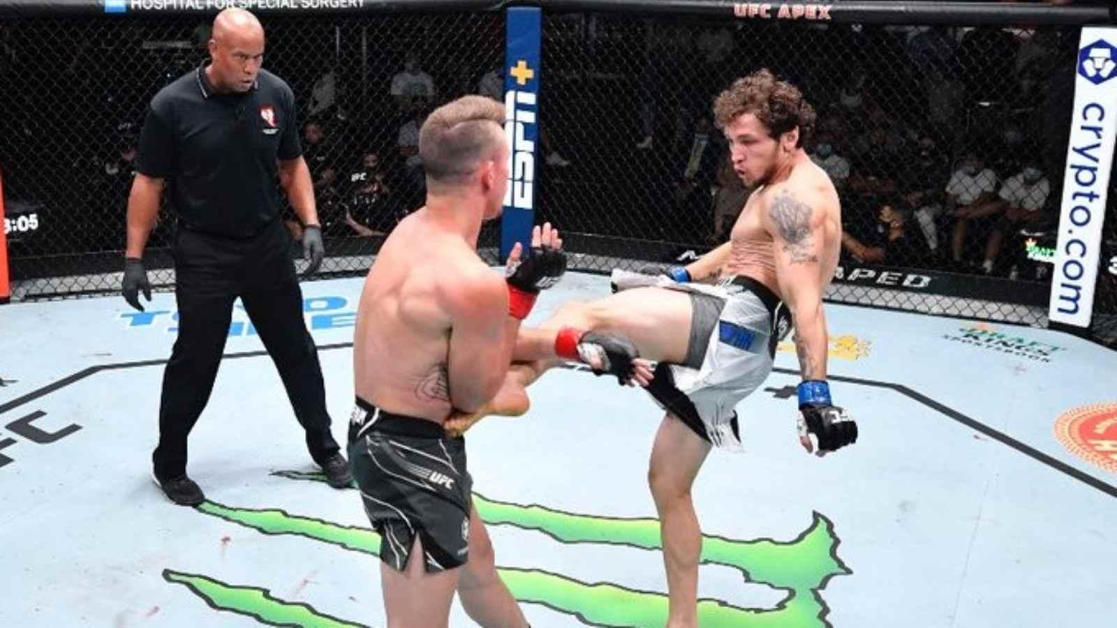 Melsik Baghdasaryan lands a body kick on Collin Anglin. Credit to: Zuffa.