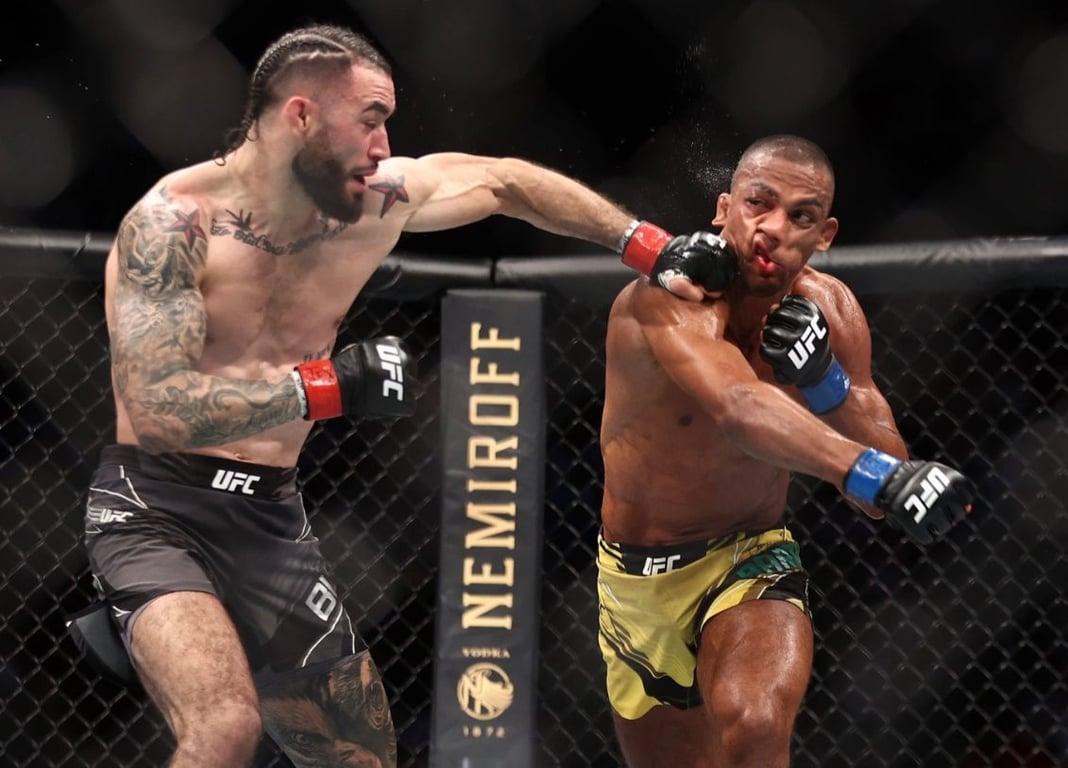 Shane Burgos goes to war with Edson Barboza. Credits to: Troy Taormina USA-TODAY Sports