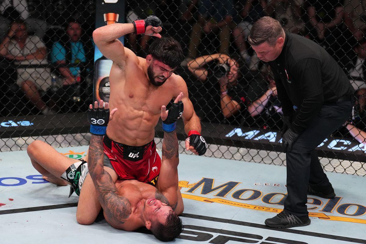 Arman Tsarukyan rains down ground and pound on Joaquim Silva. Credit: MMA Fighting.