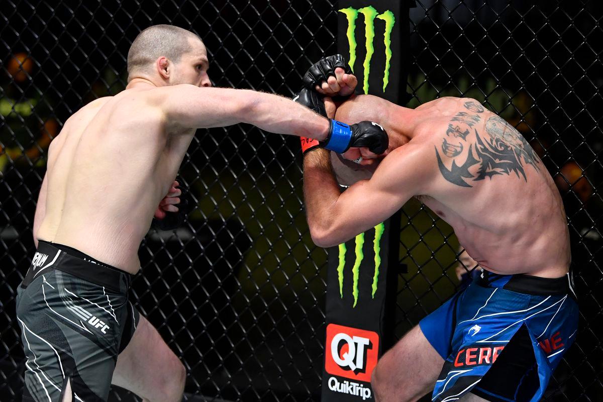 Alex Morono unloads a right hook on Donald Cerrone. Credit: MMA Fighting.
