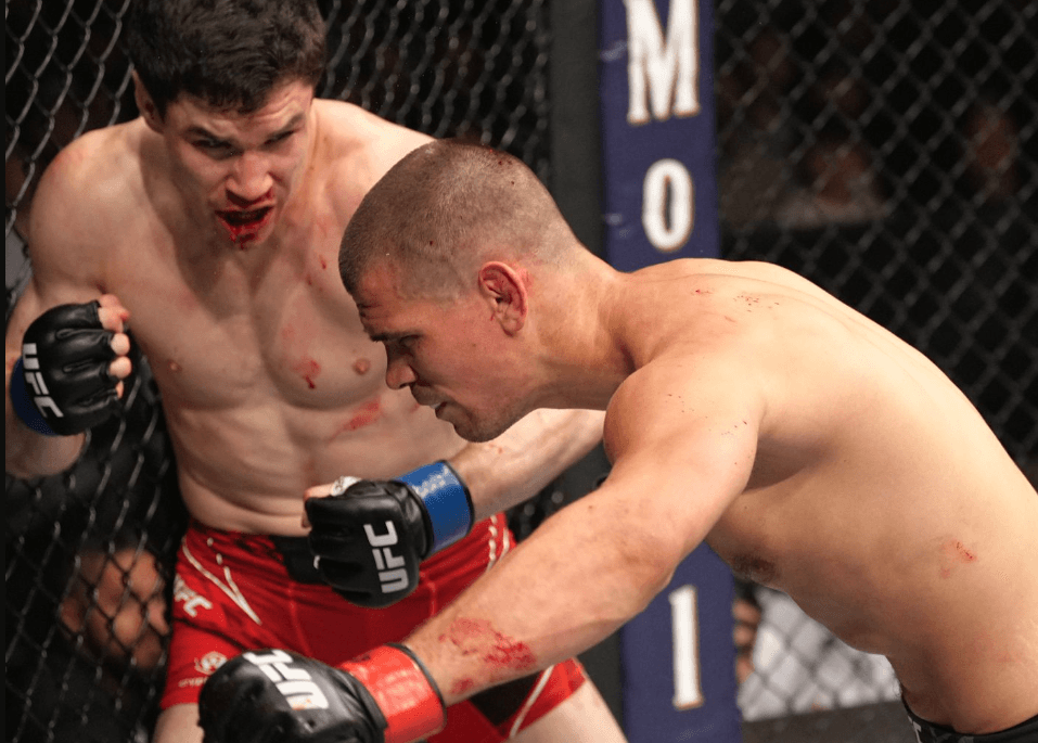 Mike Malott knocking Mickey Gall unconscious at UFC 273. Credits to: Damon Martin - MMA Fighting.