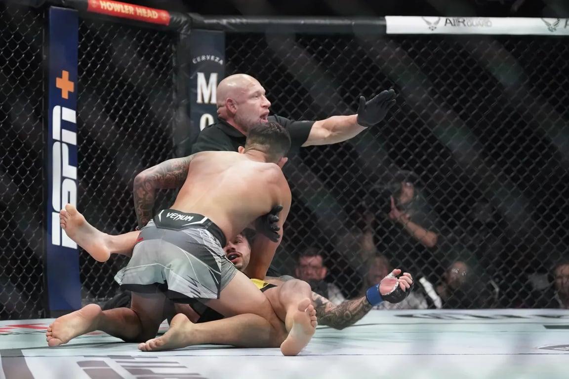 Brandon Royval finishing Matheus Nicolau. Credits to: Denny Medley - USA TODAY Sports.