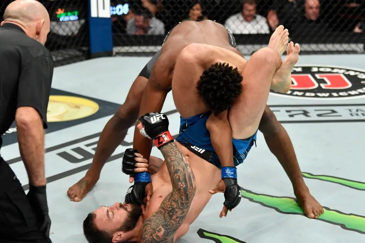 Paul Craig dislocates the arm of Jamahal Hill. Credit: Jeff Bottari/Zuffa LLC.