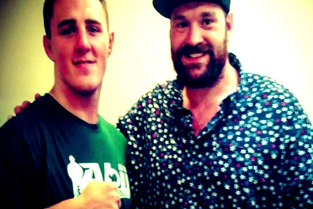 A young Tom Aspinall poses with Tyson Fury. Credit: Zuffa LLC.