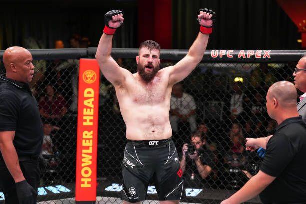 Tanner Boser raising his hands after his fight. Credits to: Chris Unger-Zuffa LLC.