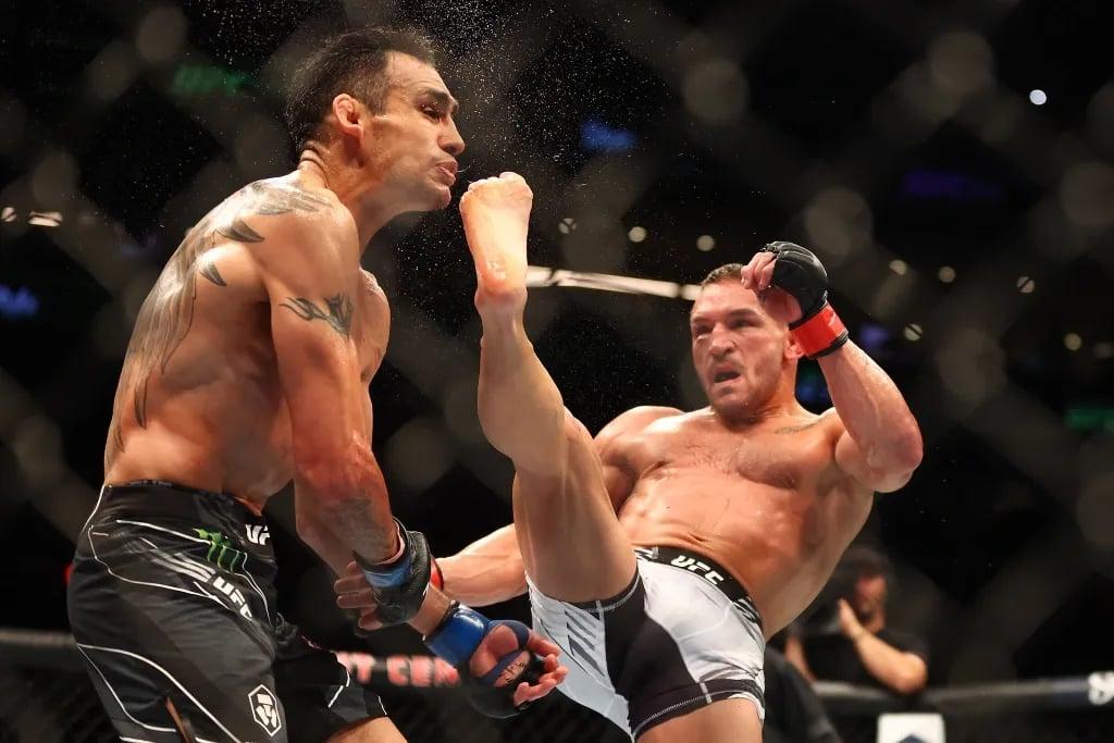 Michael Chandler lands a devastating front kick on Tony Ferguson. (Mark J. Rebilas-USA TODAY Sports)