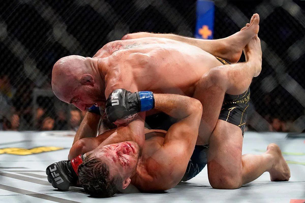 Alex Volkanovski lands ground and pound on Brian Ortega. Credit: Fight Sports.