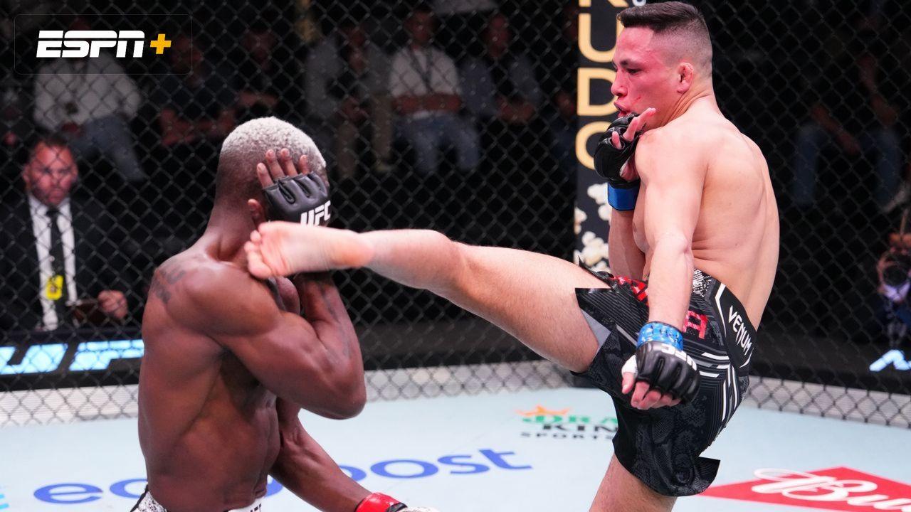 Timmy Cuamba attempts a head kick on Bolaji Oki. Credit: ESPN+.