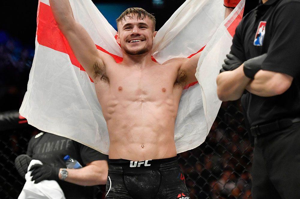 Wood celebrating with his English flag after a win. Photo by Steven Flynn.